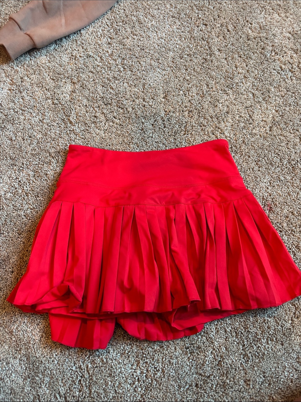 red gold hinge tennis skirt